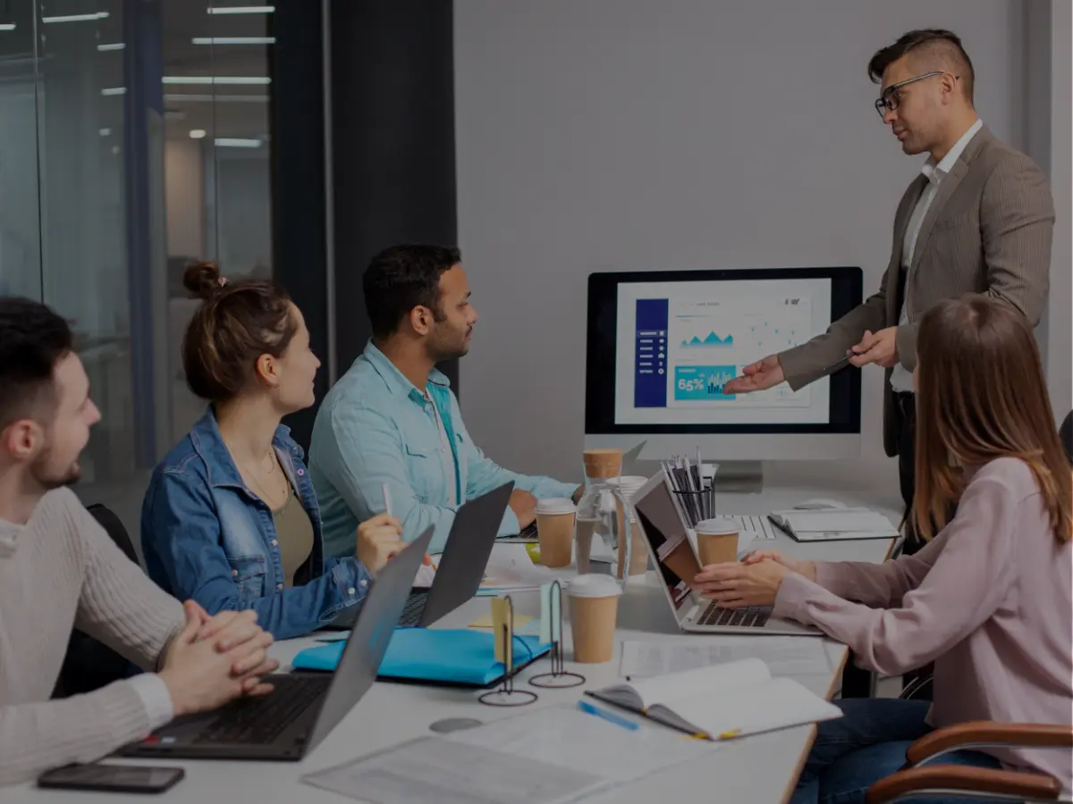 Business planning and growth discussion between consultants and a client