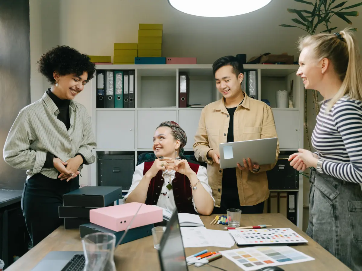 Marketing and consulting professionals reviewing strategy together in an office setting